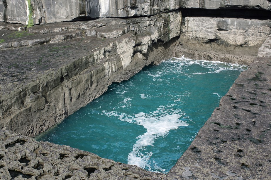 seaside rectangular pool naturally carved in a rock formation