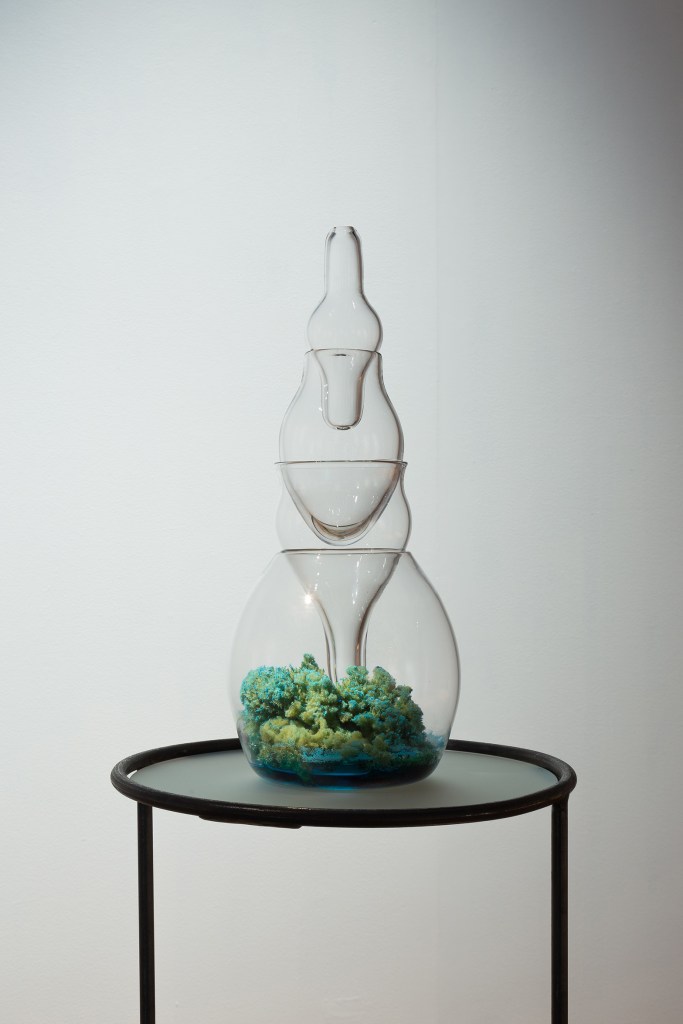 blown glass sculpture with sponge and blue pigments