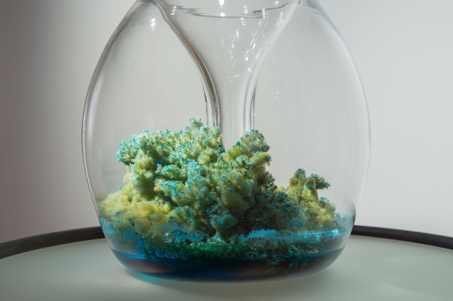 blown glass sculpture with sponge and blue pigments