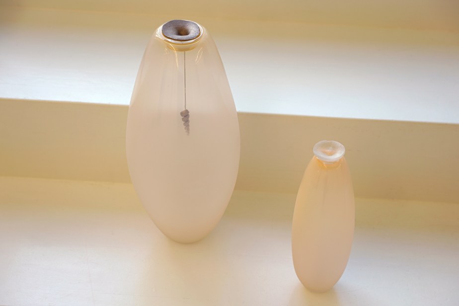 Blown glass vases with sculptures of navels